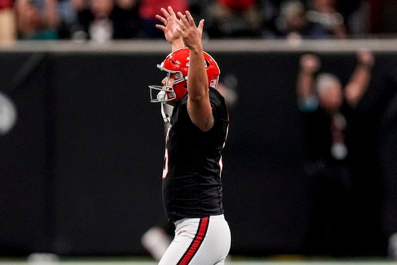 Atlanta Falcons place kicker Younghoe Koo (6) celebrates is game-winning 58-yard-field goal against the New Orleans Saints during the second half of an NFL football game, Sunday, Sept. 29, 2024, in Atlanta. (AP Photo/John Bazemore)