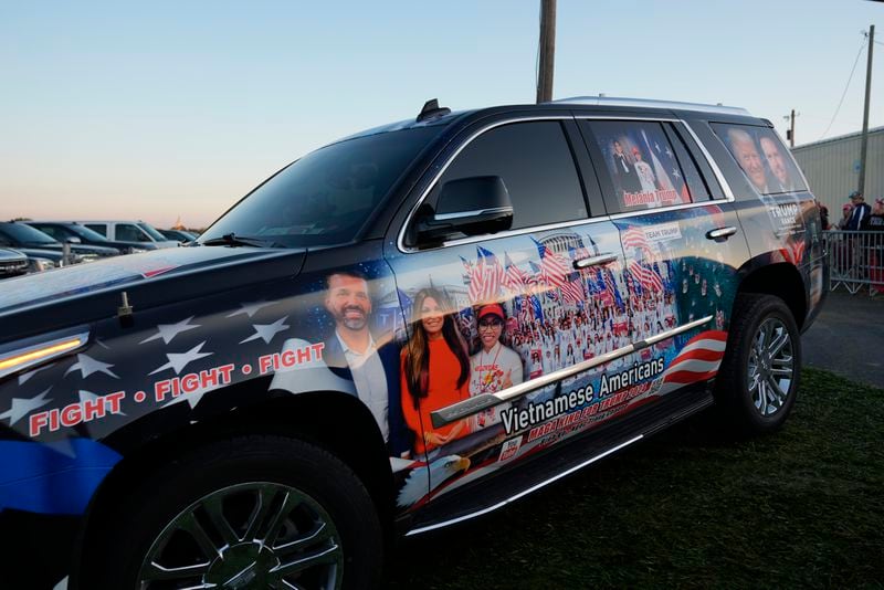 Supporters arrive before Republican presidential nominee former President Donald Trump speaks at a campaign rally at the Butler Farm Show, the site where a gunman tried to assassinate him in July, Saturday, Oct. 5, 2024, in Butler, Pa. (AP Photo/Alex Brandon)