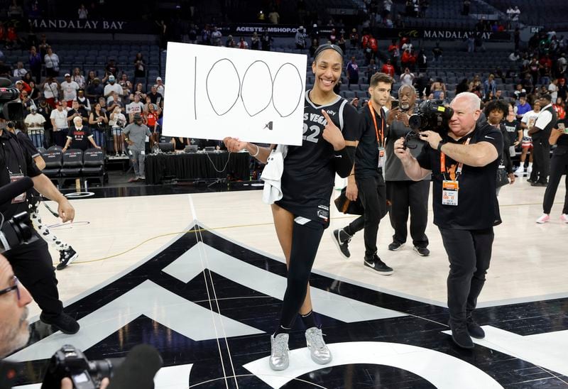 Las Vegas Aces center A'ja Wilson (22) poses after an WNBA basketball game against the Connecticut Sun, Sunday, Sept. 15, 2024, in Las Vegas.(Steve Marcus/Las Vegas Sun via AP)