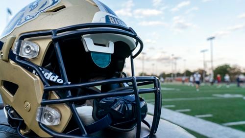 FILE - A football helmet developed by Gallaudet University with AT&T for deaf and hard-of-hearing players is seen during Gallaudet football practice at Hotchkiss Field in Washington, Oct. 10, 2023. (AP Photo/Stephanie Scarbrough, File)