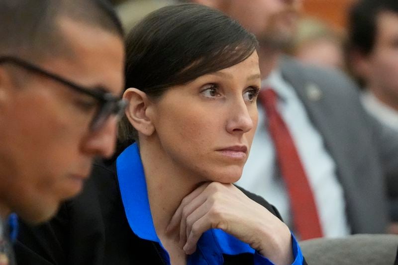 Kouri Richins, a Utah mother of three who wrote a children's book about coping with grief after her husband's death and was later accused of fatally poisoning him, looks on during a hearing Tuesday, Aug. 27, 2024, in Park City, Utah. (AP Photo/Rick Bowmer, Pool)