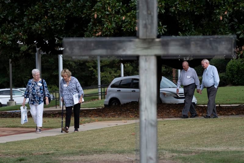 People head towards the sanctuary at Winder First United Methodist Church in Winder on Sunday, Sept. 8, 2024, the first Sunday following the shootings at Apalachee High School. Ben Gray for the Atlanta Journal-Constitution