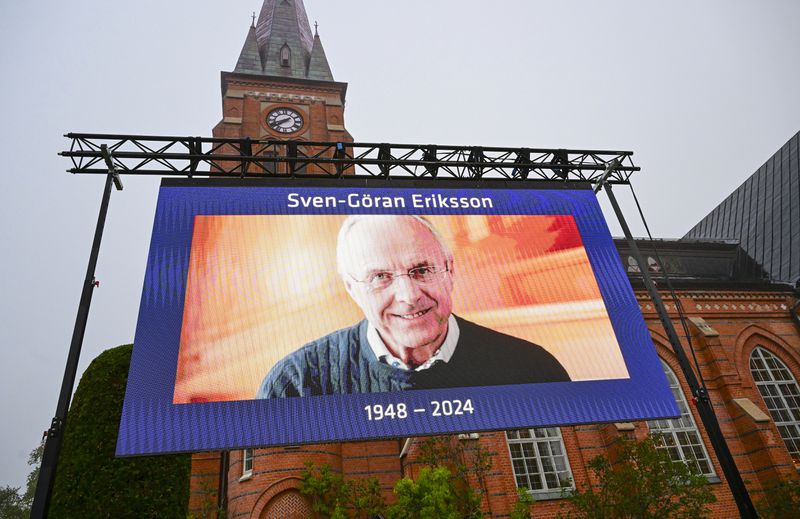 A general view of a screen outside Fryksande Church in Torsby, Sweden, ahead of the funeral for football legend Sven-Goran Eriksson, Friday, Sept. 13, 2024. (Jonas EkströmerTT News Agency via AP)