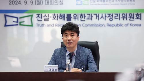 Lee Sang Hoon, a standing commissioner, speaks to the media during a news conference at the Truth and Reconciliation Commission in Seoul, South Korea, Monday, Sept. 9, 2024. (Im Hwa-young/Yonhap via AP)