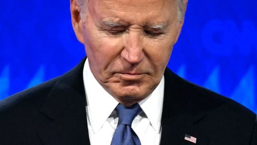 President Joe Biden looks down as he participates in the first presidential debate of the 2024 elections with former President Donald Trump in Atlanta on Thursday, June 27, 2024. (Andrew Caballero-Reynolds/AFP/Getty Images/TNS)