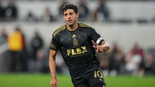 FILE - Los Angeles FC forward Carlos Vela chases the ball during the second half of an MLS soccer match against the Real Salt Lake on Oct. 1, 2023, in Los Angeles. (AP Photo/Jae C. Hong, File)