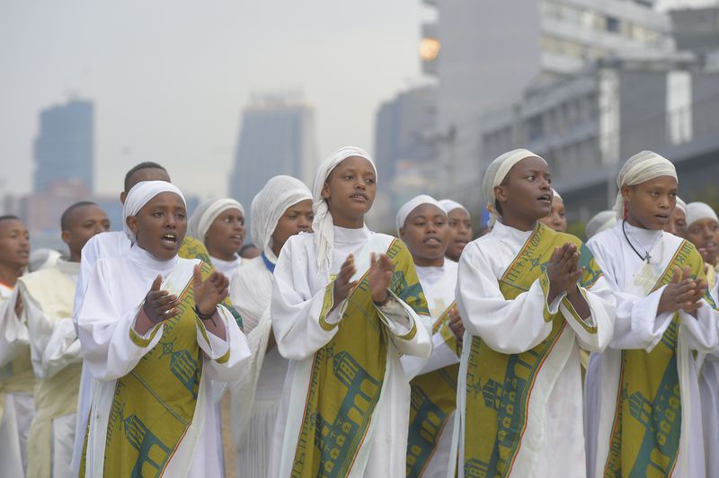 Ethiopian women sing to celebrate Meskel, meaning the Cross in Amharic, is an annual religious holiday among Orthodox in Addis Ababa, Ethiopia Thursday, Sept. 26, 2024. (AP Photo)