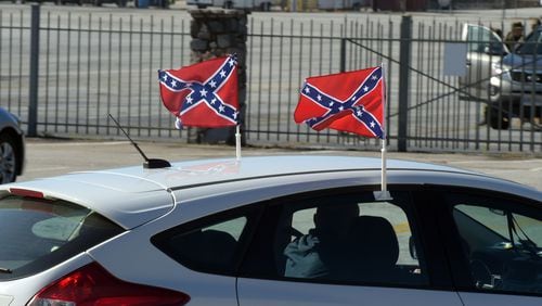 NOVEMBER 15, 2015 STONE MOUNTAIN Pro-Confederate flag supporters start to arrive at Stone Mountain, Saturday, November 14, 2015, to protest after a proposal was made to place a monument on top of it dedicated to Martin Luther King Jr. Hundreds of people -- possibly with KKK ties -- are expected to attend and park police will be on alert. KENT D. JOHNSON/KDJOHNSON@AJC.COM