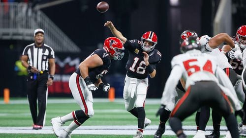 Falcons quarterback Kirk Cousins (18) throws the ball during the first half of an NFL football game against the Tampa Bay Buccaneers on Thursday, October 3, 2024, at Mercedes-Benz Stadium in Atlanta. 
(Miguel Martinez/ AJC)