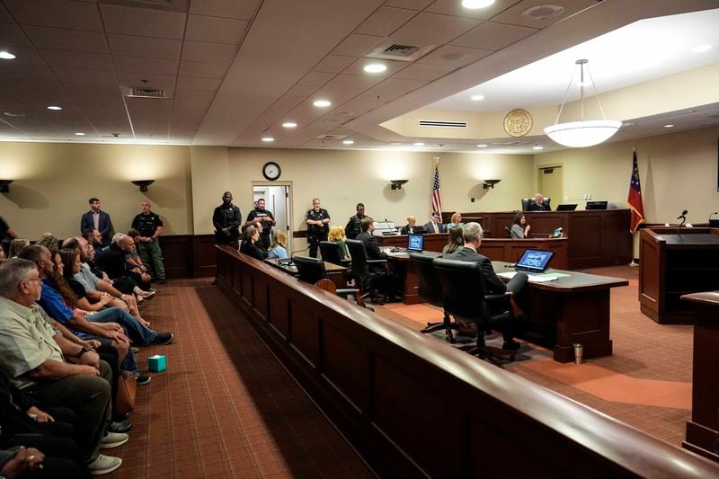 Colt Gray, left, sits in the Barrow County courthouse during his first appearance for the Wednesday shooting at Apalachee High School, Friday, Sept. 6, 2024, in Winder, Ga. (AP Photo/Brynn Anderson, Pool)