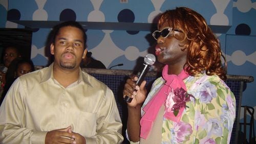 On October 14, 2005, at the then Vision nightclub, drag queen Miss Sophia McIntosh goof around with Nicholas Sheriff of Snellviille during V-103 morning co-host Wanda Smith's happy hour party. CREDIT: Rodney Ho/rho@ajc.com
