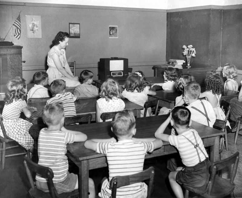 The Atlanta school system pioneered with radio receivers in classrooms in 1926 and got its own station in 1948, WABE-FM, to which these students are listening. Later, many of us spent our school days watching educational films on wobbly projectors which... doesn't seem quite as cool as this. 