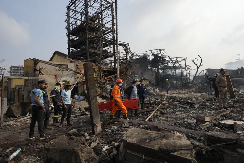 National Disaster Response Force rescuers work at the site after an explosion and fire at a chemical factory in Dombivali near Mumbai, India, Friday, May 24, 2024. Multiple people were killed and dozens were injured in the incident that happened Thursday. (AP Photo/Rajanish Kakade)
