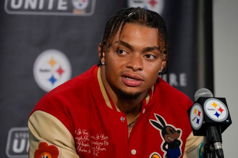 Pittsburgh Steelers quarterback Justin Fields talks to reporters following an NFL football game against the Dallas Cowboys, early Monday, Oct. 7, 2024, in Pittsburgh. The Cowboys won 20-17. (AP Photo/Gene J. Puskar)