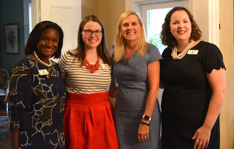 Marty Kemp with Junior League of Cobb-Marietta members Ni’Cole McCrae, left and Kim Cortes and 2019-20 League president Katie Stieber.