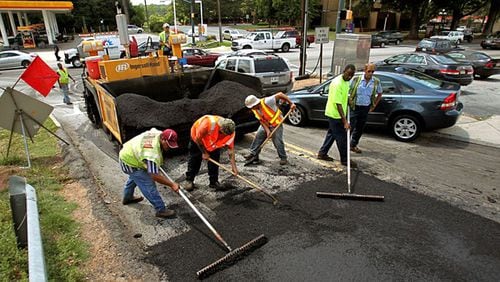 Twenty-seven street segments totaling about 2.9 miles will be resurfaced in Sandy Springs, funded in part by $997,921 in state grant monies. AJC FILE