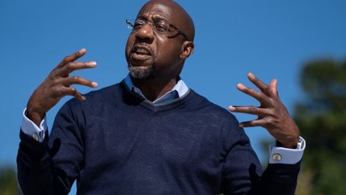 The Rev. Raphael Warnock is attempting to make history by climbing out of Savannah’s Kayton Homes projects to become Georgia’s first Black U.S. senator. Ben Gray for the Atlanta Journal-Constitution