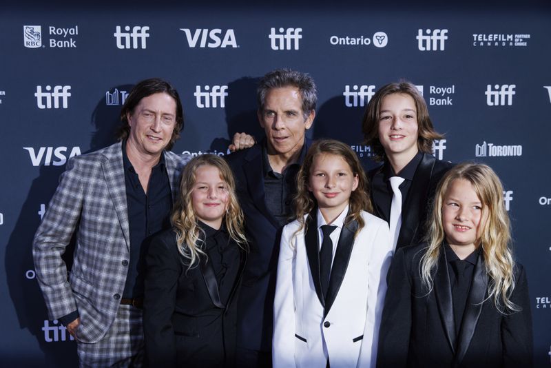 From left, David Gordon Green, Arlo Janson, Ben Stiller, Ulysses Janson, Homer Janson and Atlas Janson are photographed as they arrive for the premiere of "Nutcrackers" at Roy Thomson Hall, during the Toronto International Film Festival in Toronto, Thursday, Sept. 5, 2024. (Cole Burston/The Canadian Press via AP)