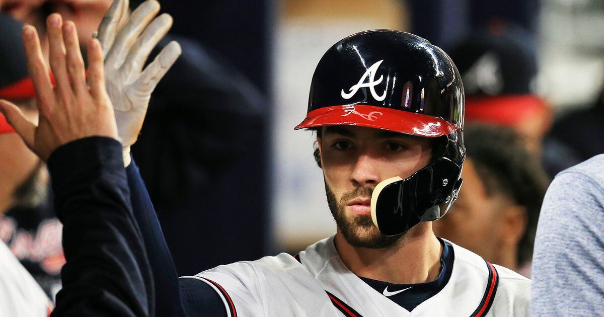 Atlanta Braves News Now - Why does Dansby #Swanson wear his glove on his  head?