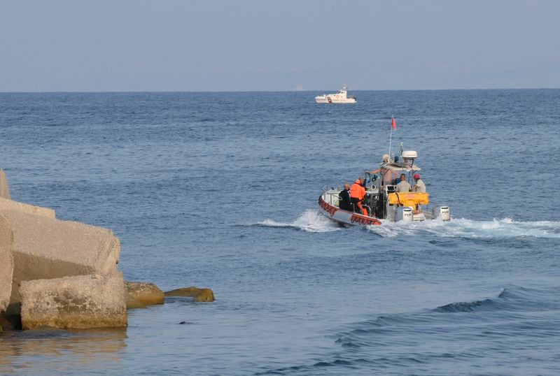 Italian Firefighters scubadivers sails towards the area where the UK flag vessel Bayesan that was hit by a violent sudden storm, sunk early Monday, Aug. 19, 2024, while at anchor off the Sicilian village of Porticello near Palermo, in southern Italy. (AP Photo/Lucio Ganci)