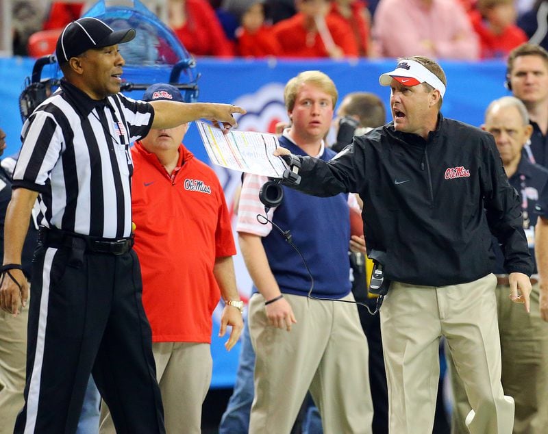 Ole Miss head coach Hugh Freeze argues a call with an official during first half play against TCU in the Chick-fil-A Peach Bowl on Wednesday, Dec. 31, 2014, in Atlanta. Curtis Compton / ccompton@ajc.com