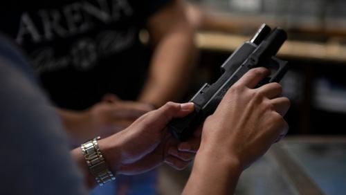 FILE — A pistol user at a firing range is shown in a file photo. (Callaghan O'Hare/The New York Times)