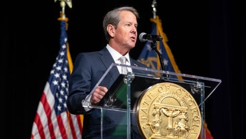 Democrats have challenged a Georgia law that allows Gov. Brian Kemp and other top elected officials to circumvent limits on campaign contributions. (File photo by Ben Hendren for the Atlanta Journal-Constitution)