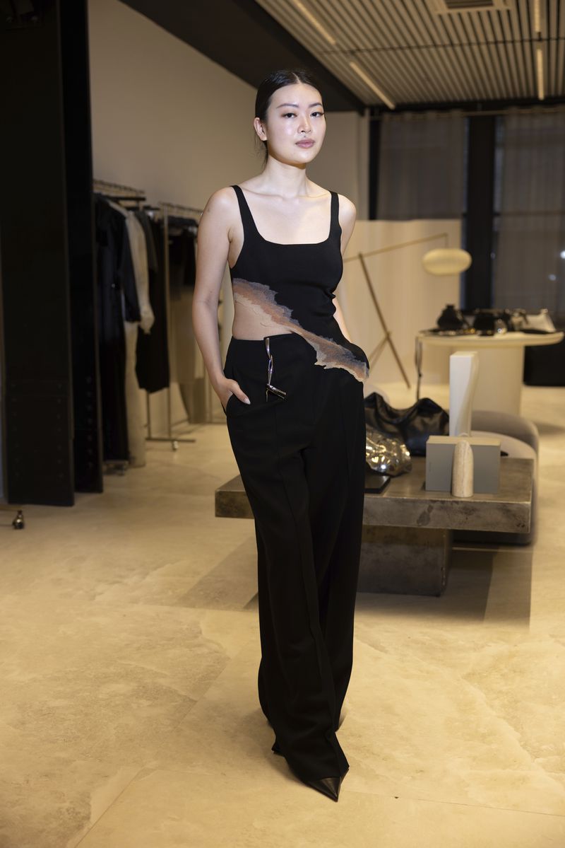 Singapore designer Grace Ling poses in her showroom where she displays her 3D printed designs on Friday, Sept. 13, 2024, in New York. Ling, a CFDA/Vogue Fashion Fund finalist, showcased her latest collection at New York Fashion Week. (Photo by Matt Licari/Invision/AP)