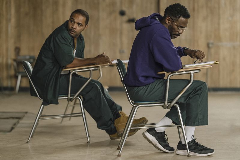 This image released by A24 shows Colman Domingo, right, and Clarence Maclin in a scene from "Sing Sing." (A24 via AP)