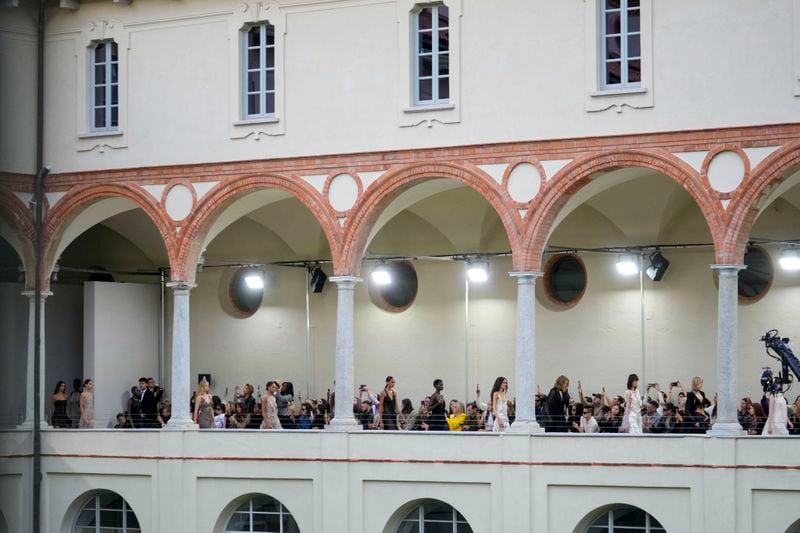 Models wear creations as part of the Alberta Ferretti Spring Summer 2025 collection, that was presented in Milan, Italy, Tuesday, Sept. 17, 2024. (AP Photo/Luca Bruno).