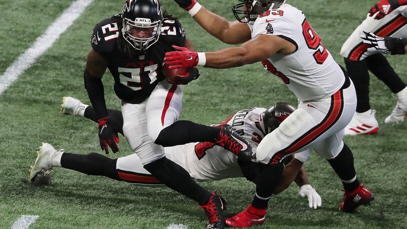 Atlanta Falcons running back Todd Gurley II carries the ball up