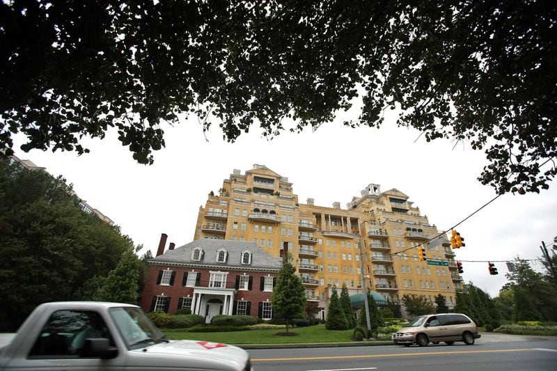 The Randolph-Lucas House, built in 1924 for Thomas Jefferson’s great-great grandson, is seen in its original setting, near the Peachtree Battle shopping center. Owners of the condominiums behind it sought to have the house demolished in order to build an open-air pavilion. Photo: Jason Getz