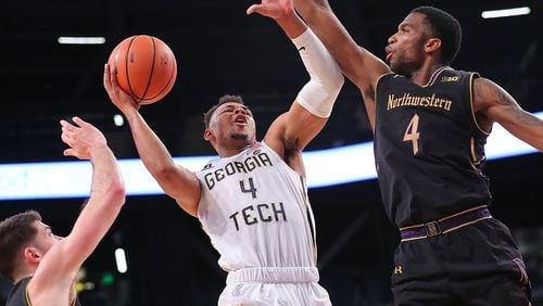 Georgia Tech guard Brandon Alston battles to the basket against Northwestern forward Vic Law on Tuesday, November 28, 2017, in Atlanta.  Curtis Compton/AJC file