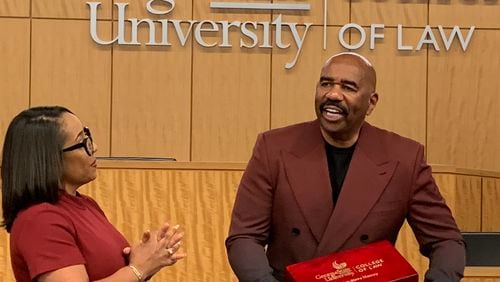 Mo Ivory gave Steve Harvey a special judge's gavel as a gift for speaking to her Georgia State University College of Law class after spending a semester sifting through his legal agreements. RODNEY HO/rho@ajc.com