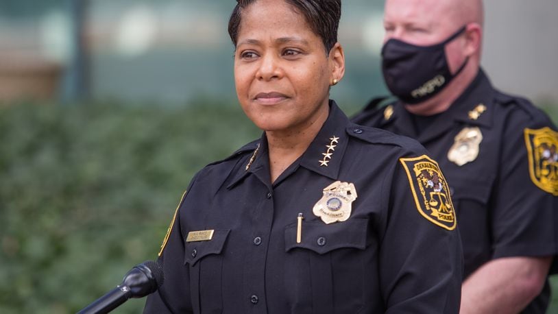 DeKalb County Police Chief Mirtha Ramos, at podium, leads a press conference Thursday, March 18, 2021 announcing the reunion of 1-year-old Royalty Grisby with her mother after the child was taken by a 14-year-old in a stolen car 12 hours earlier.  (Jenni Girtman for The Atlanta Journal-Constitution)