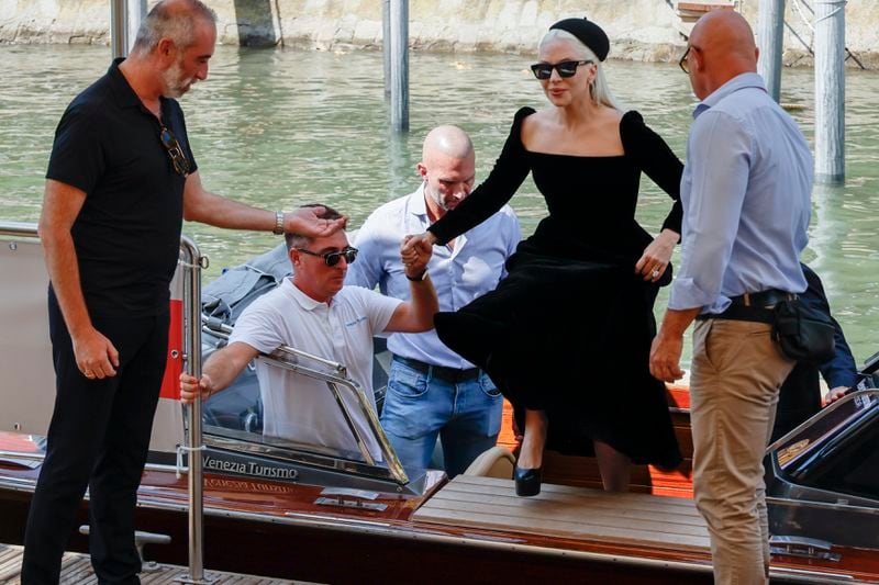 Lady Gaga, centre, upon arrival for the press conference of the film 'Joker: Folie A Deux' during the 81st edition of the Venice Film Festival in Venice, Italy, on Wednesday, Sept. 4, 2024. (Photo by Joel C Ryan/Invision/AP)