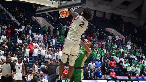 March 11, 2022 Macon - Grovetown's Frankquon Sherman (2) dunks the ball at the end of the 4th quarter during the 2022 GHSA State Basketball Class AAAAAA Boys Championship game at the Macon Centreplex in Macon on Friday, March 11, 2022. Grovetown won 66-59 over Buford.  (Hyosub Shin / Hyosub.Shin@ajc.com)