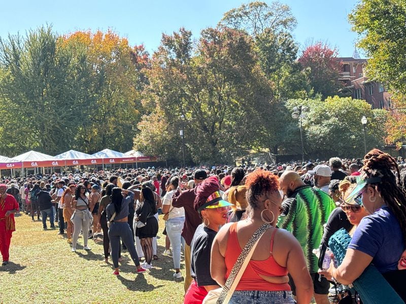ONE Musicfest's expectation of larger crowds this year appears likely with the line forming for the opening on Saturday afternoon, Oct. 28, 2023, at Piedmont Park in Atlanta. (Leon Stafford/AJC)