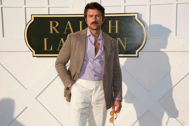 Brandon Sklenar attends the Ralph Lauren Spring/Summer 2025 fashion show as part of New York Fashion Week on Thursday, Sept. 5, 2024, at Khalily Stables in Bridgehampton, N.Y. (Photo by Charles Sykes/Invision/AP)