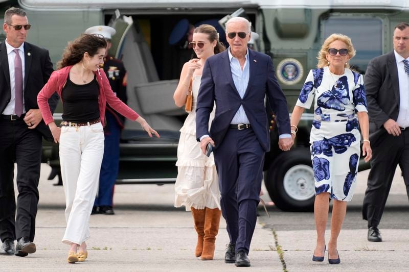 President Joe Biden, center right, and first lady Jill Biden, right, arrive on Marine One with granddaughters Natalie Biden, from left, and Finnegan Biden, at East Hampton Airport, Saturday, June 29, 2024, in East Hampton, N.Y. (AP Photo/Evan Vucci)