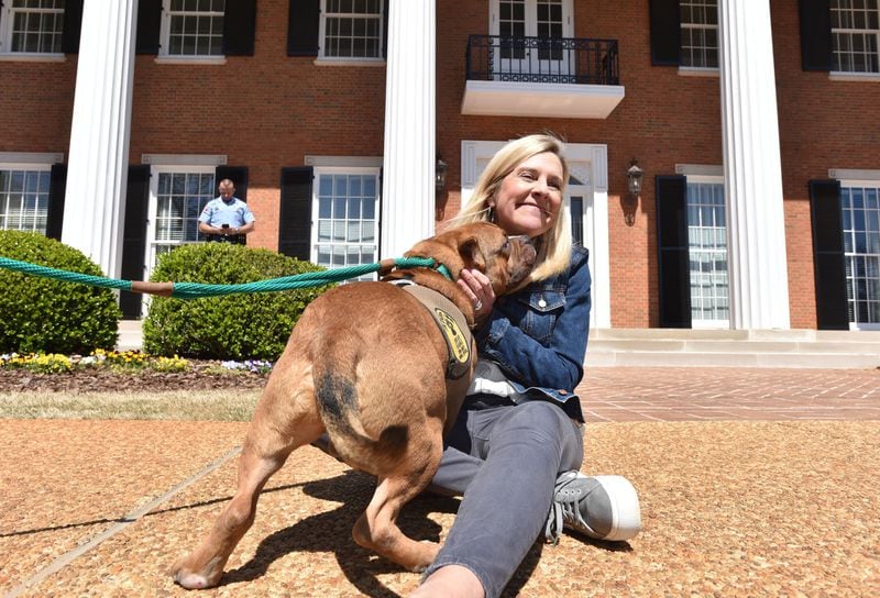 First Lady Marty Kemp and Major, a friendly mixed breed who visited from Cobb County the other day. Photo: Hyosub Shin