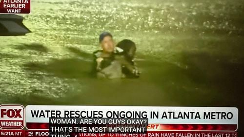 Fox Weather meteorologist Bob Van Dillen saved a woman in Buckhead Friday morning from her submerged car. FOX WEATHER