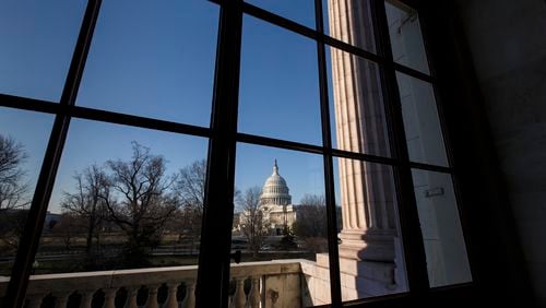 FILE - The Capitol is seen from the Russell Senate Office Building as Congress returns from a district work week, in Washington, March 24, 2014. (AP Photo/J. Scott Applewhite, File)