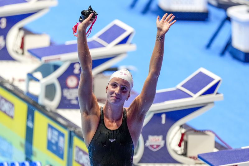 Regan Smith reacts after winning the Women's 100 backstroke finals Tuesday, June 18, 2024, at the US Swimming Olympic Trials in Indianapolis. (AP Photo/Michael Conroy)