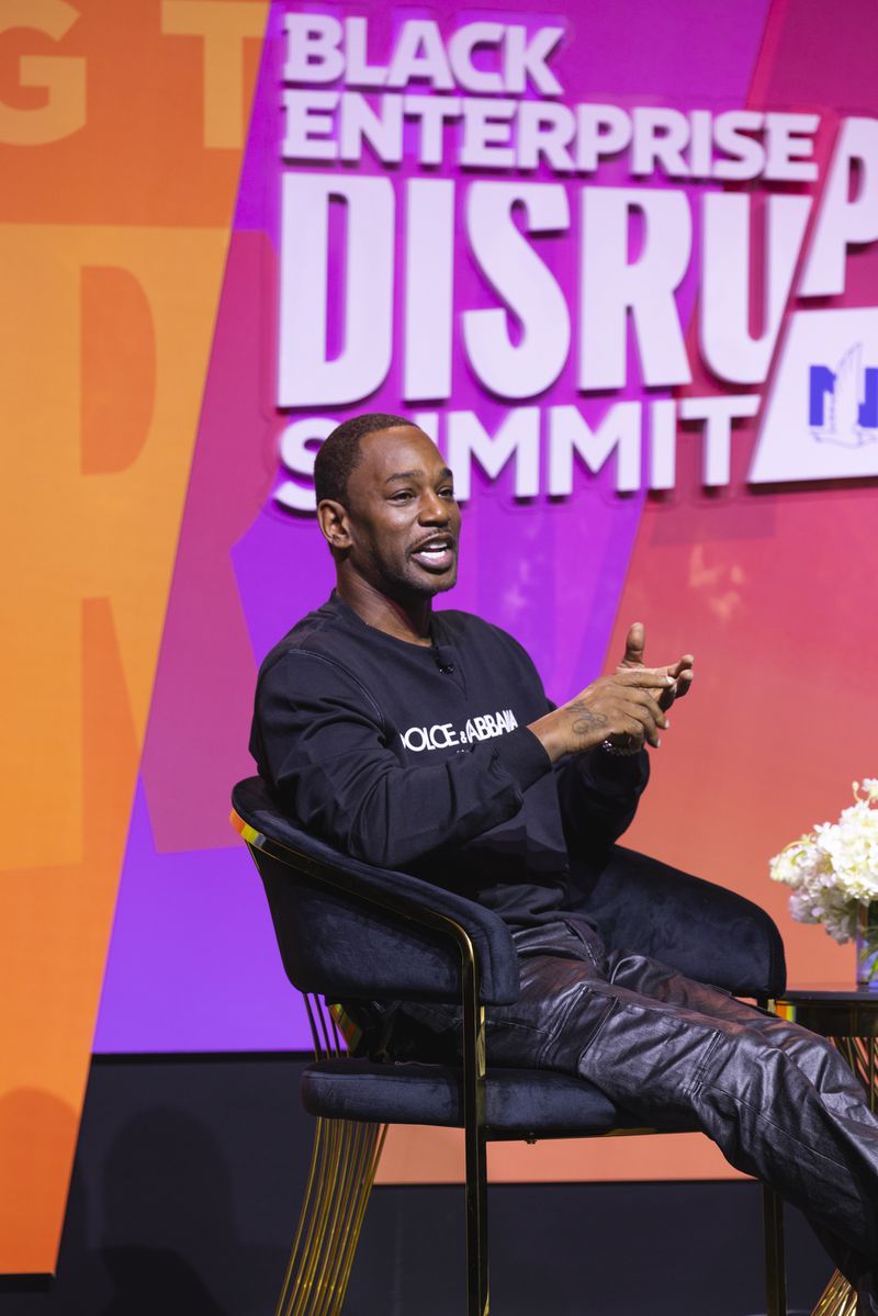 Rapper and podcaster Cameron "Cam'ron" Giles onstage at the 2024 Black Enterprise Disruptor Summit in Atlanta.