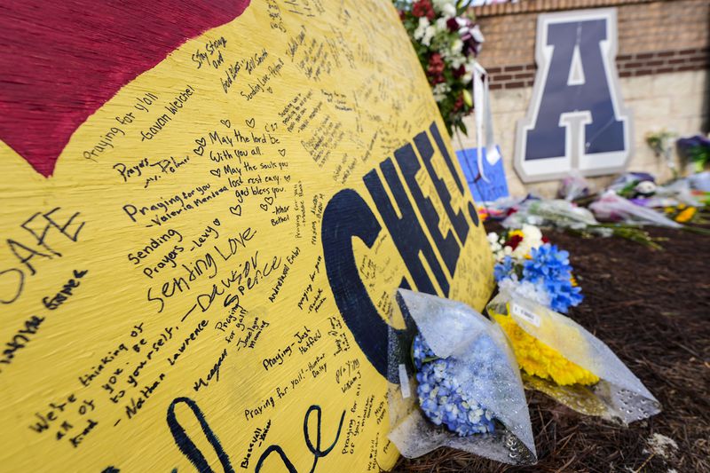 A memorial is seen at Apalachee High School after the Wednesday school shooting, Saturday, Sept. 7, 2024, in Winder, Ga. (AP Photo/Mike Stewart)