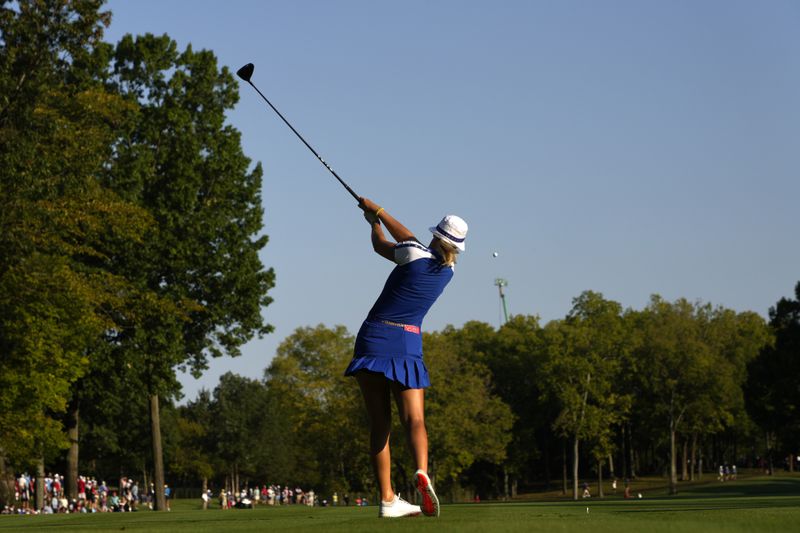 Europe's Anna Nordqvist hits from the fifth tee during a Solheim Cup golf tournament foursome match at Robert Trent Jones Golf Club, Saturday, Sept. 14, 2024, in Gainesville, Va. (AP Photo/Matt York)