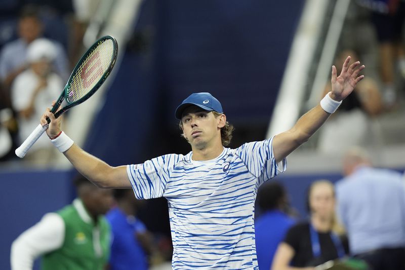 Alex de Minaur, of Australia, eacts after defeating Jordan Thompson, of Australia, during a fourth round match of the U.S. Open tennis championships, Monday, Sept. 2, 2024, in New York. (AP Photo/Eduardo Munoz Alvarez)