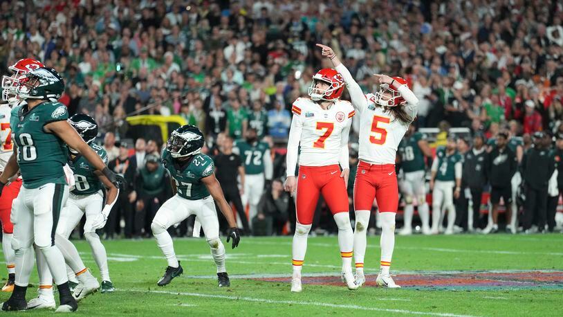 Kansas City Chiefs place kicker Harrison Butker (7) celebrates