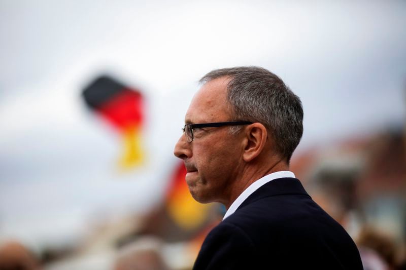 FILE - Joerg Urban, top candidate of German Alternative for Germany, AfD, party for the Saxony state elections, attends an election campaign rally of his party in Bautzen, Aug. 15, 2019. (AP Photo/Markus Schreiber, File)